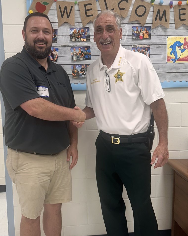 Sheriff Mike Chitwood and Commissioner Davison Heriot at a Deltona elementary school